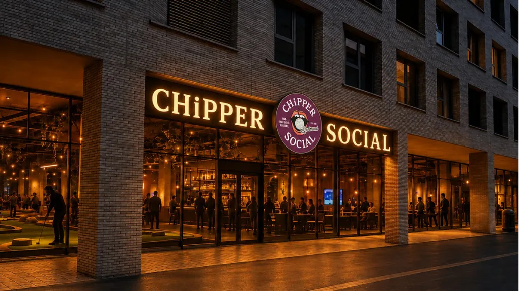 The illuminated Chipper Social venue frontage at night